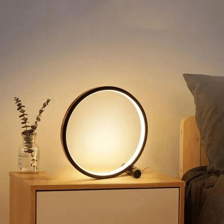 Aluminiowa lampa stołowa LED o okrągłym designie